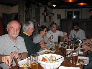 Participants at the 2012 UNIGIS meeting share a meal in Salzburg.